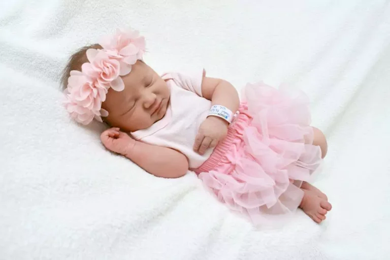 Contact us Baby girl in pink tutu